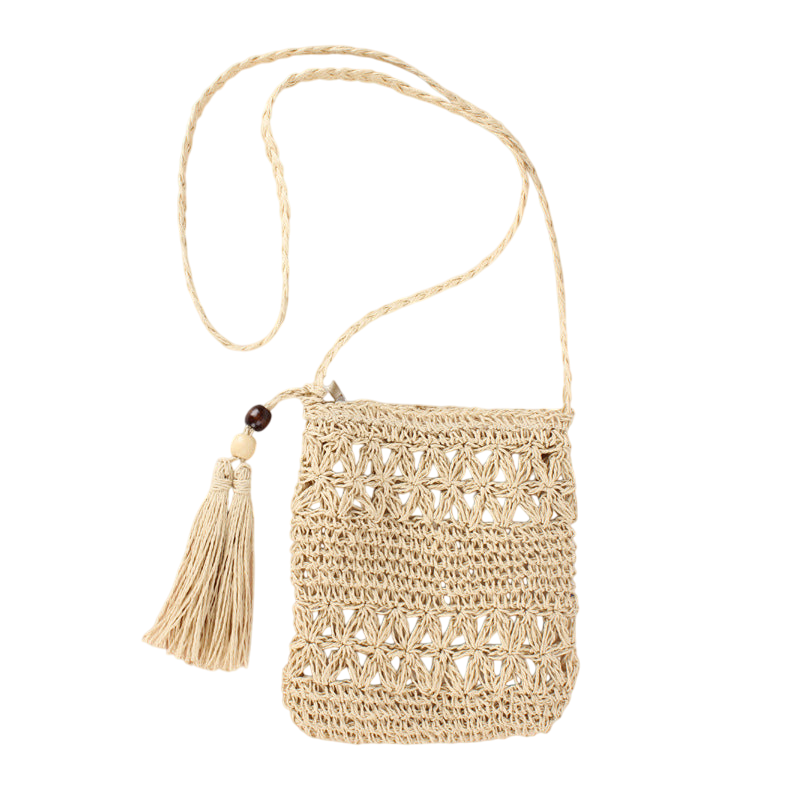 Natural Straw Hollow‑Cut Cross‑Body Bag – Tassel Accent, Hand‑Woven | noémi