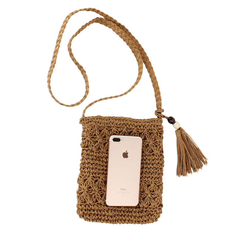 Natural Straw Hollow‑Cut Cross‑Body Bag – Tassel Accent, Hand‑Woven | noémi