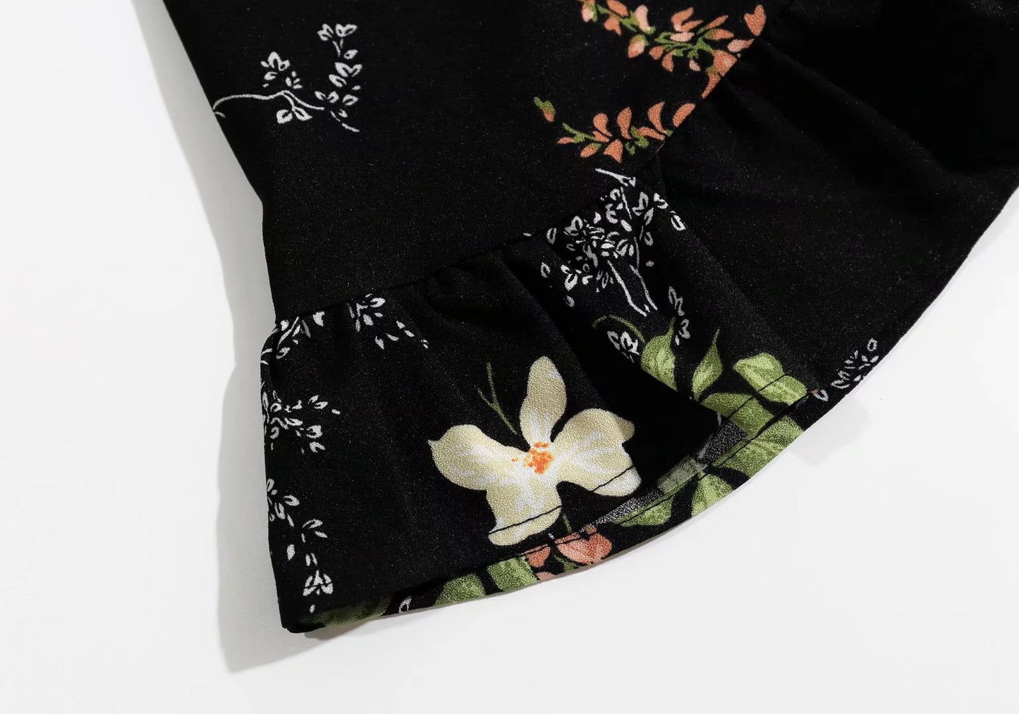 V Neck Backless Dress With Cutout Detail And Scattered Floral Ruffles | noémi