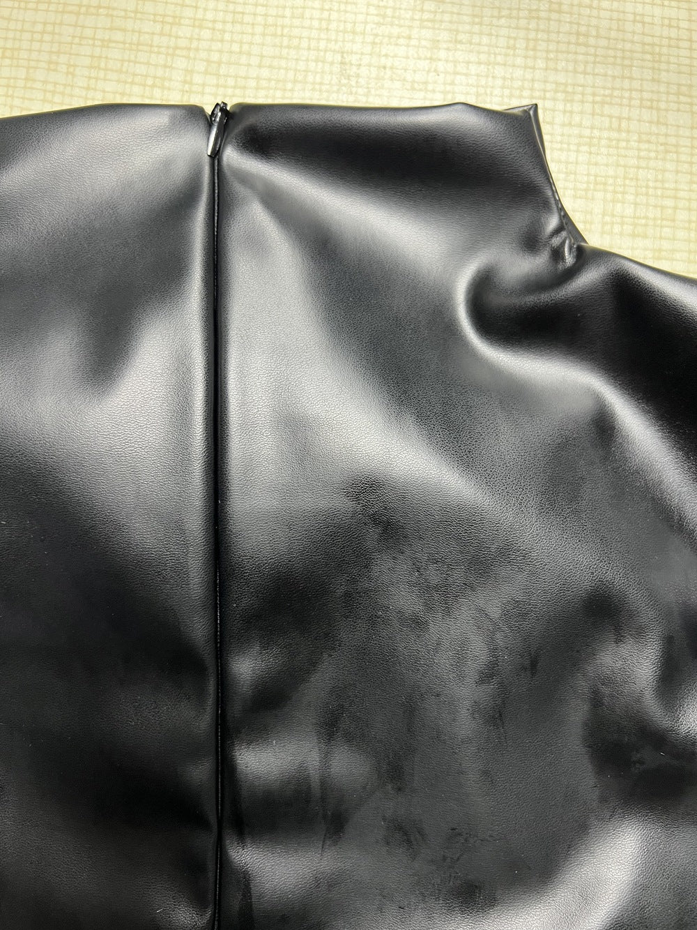 Womens Sleeveless Faux Leather Sheath Dress with Stand Collar Pleated Waist Hem | noémi