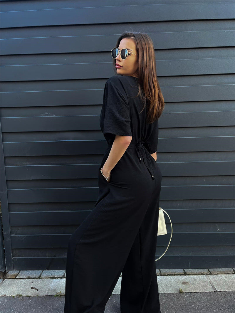 Women's Solid Color One Piece Jumpsuit | Deep V Neck, Tied Waist & Wide Leg Pants | noémi
