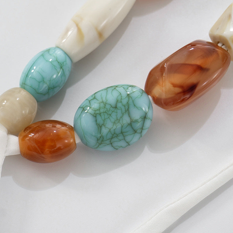 White Halter Tie Back Top with Gemstone Beaded Neck | noémi