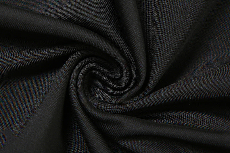 Halter Romper | Deep V Plunge, Ruffled Hem, Backless | noémi