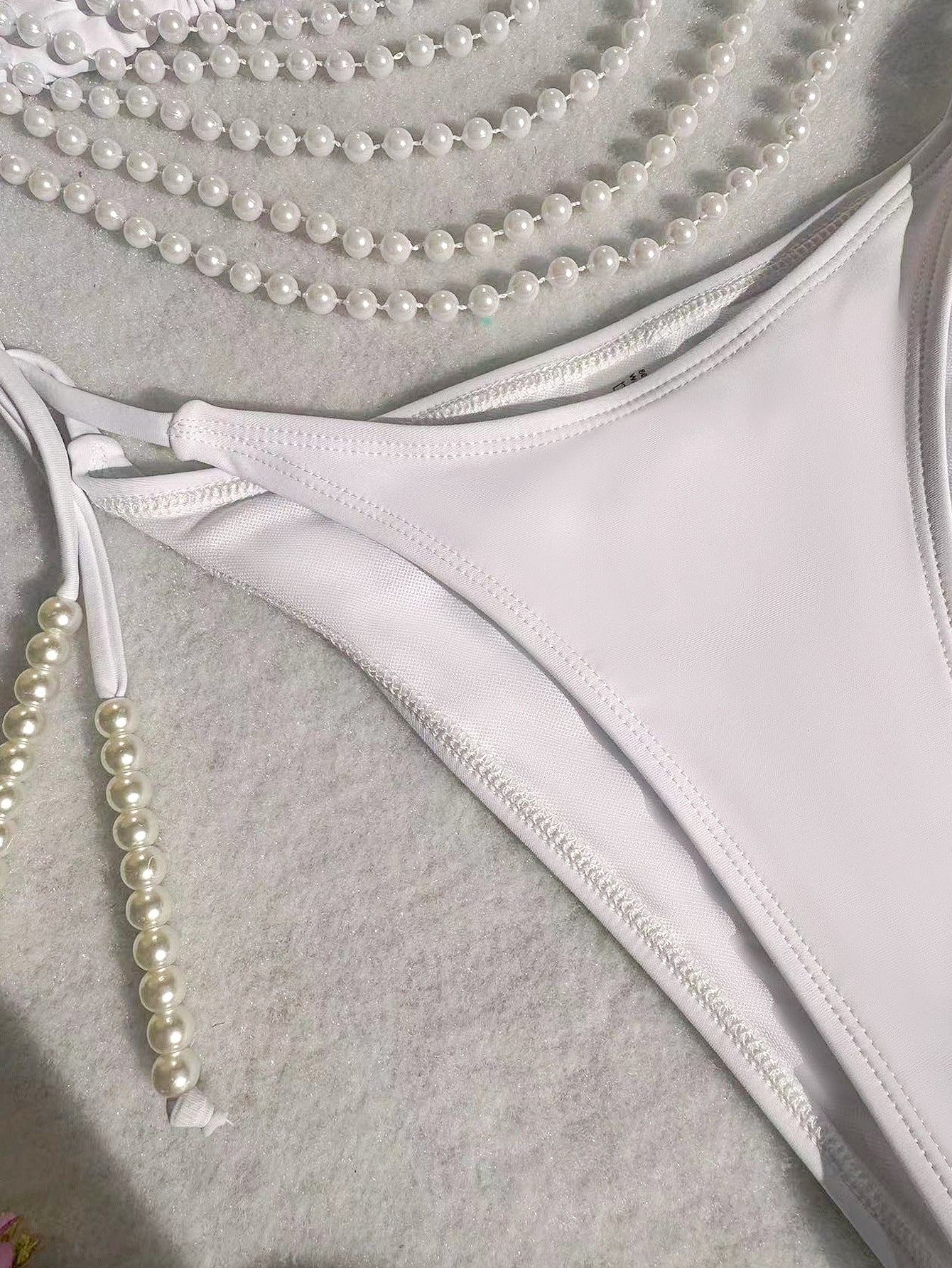 Pearl Chain Bikini | White Swimsuit with Drape Beads, Two-Piece Split Design | noémi