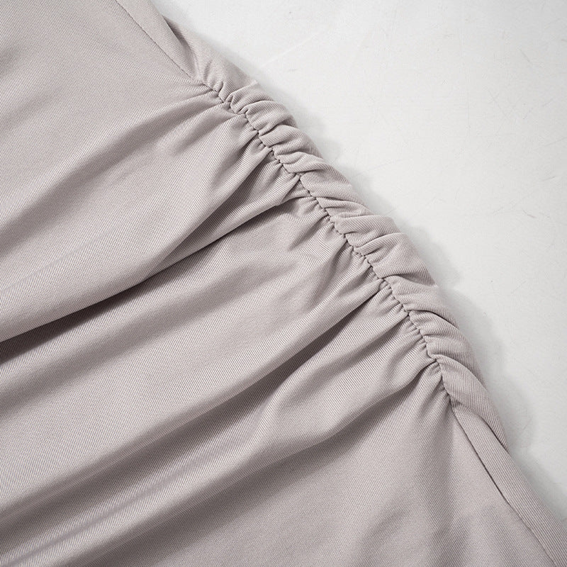 Women Long Sleeve Hooded Pleated Dress with High Waist and Hip Detail | noémi