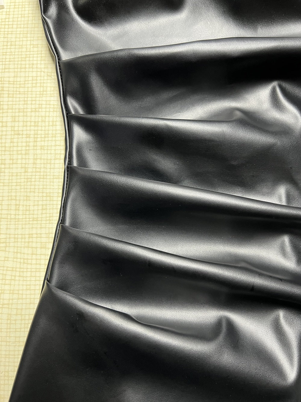 Womens Sleeveless Faux Leather Sheath Dress with Stand Collar Pleated Waist Hem | noémi