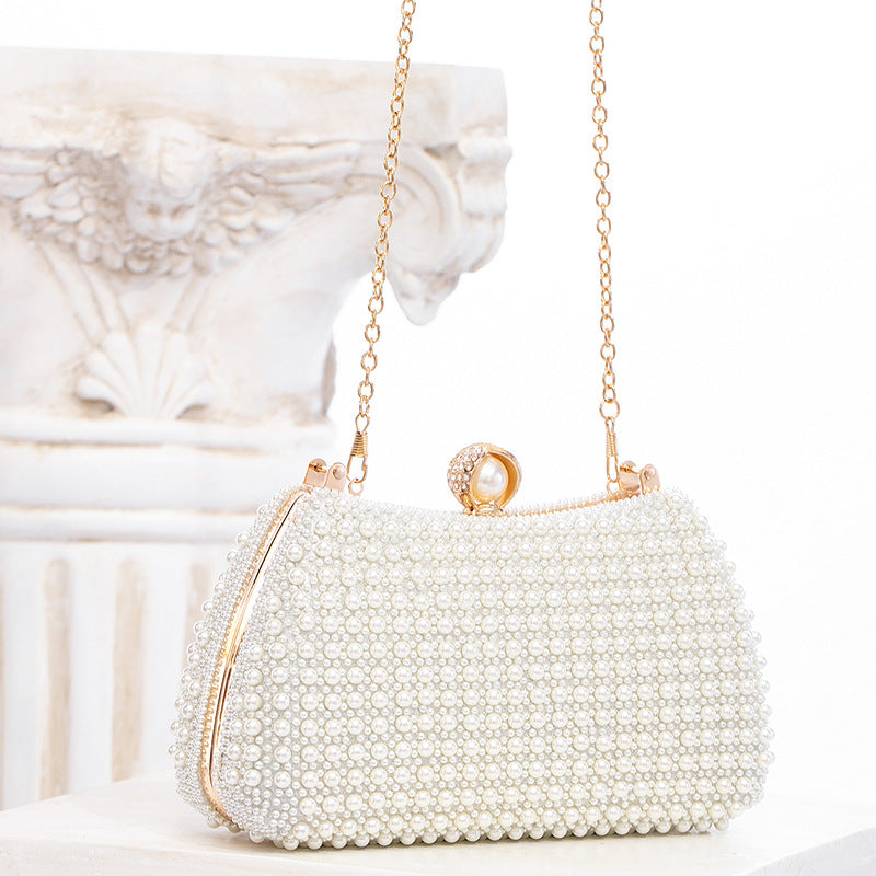 Elegant Pearl Evening Bag | White Clutch with Gold Chain for Parties & Events | noémi