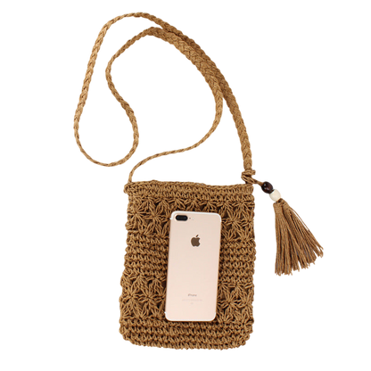 Natural Straw Hollow‑Cut Cross‑Body Bag – Tassel Accent, Hand‑Woven | noémi