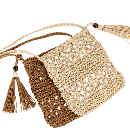 Natural Straw Hollow‑Cut Cross‑Body Bag – Tassel Accent, Hand‑Woven | noémi