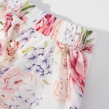 Floral Two Piece Set | Sleeveless Halter Crop Top & Ruffled Mini Skirt | noémi