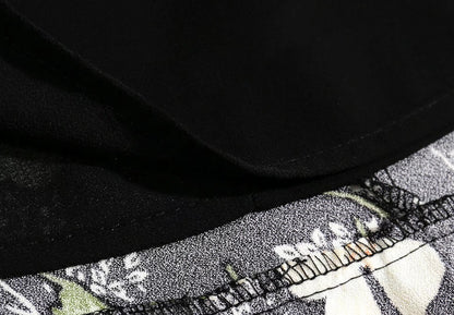 V Neck Backless Dress With Cutout Detail And Scattered Floral Ruffles | noémi