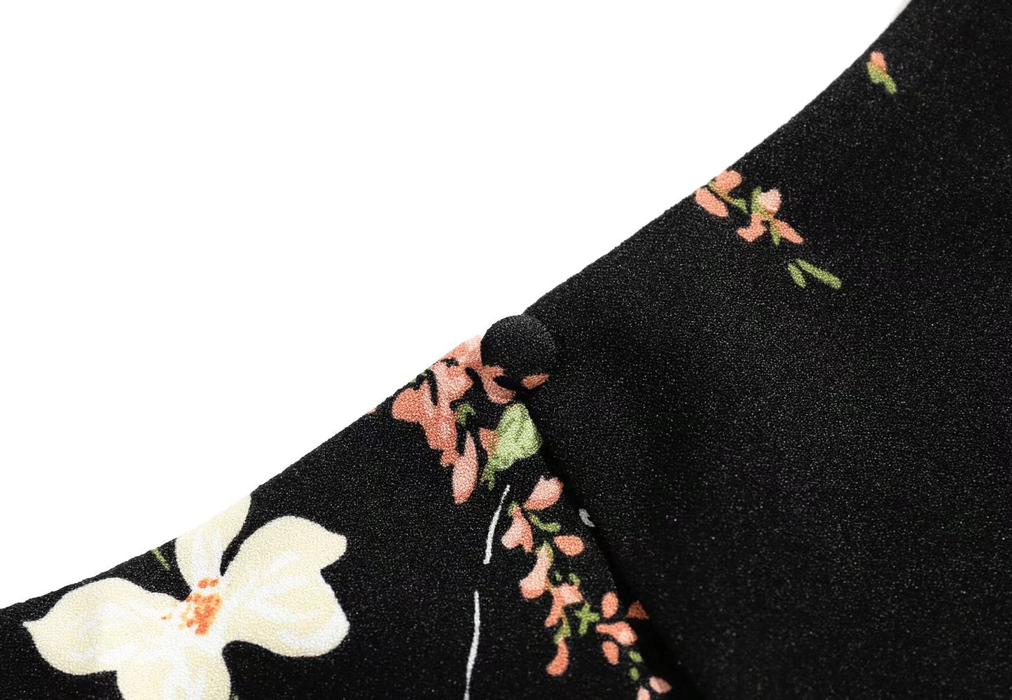 V Neck Backless Dress With Cutout Detail And Scattered Floral Ruffles | noémi