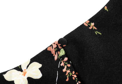 V Neck Backless Dress With Cutout Detail And Scattered Floral Ruffles | noémi