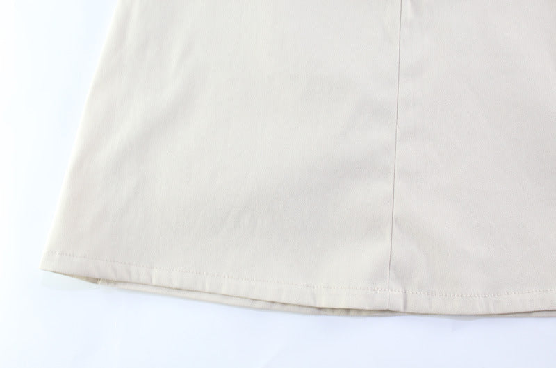 High Neck Seam Detail Mini Dress | Structured Sleeveless ALine in Sand Beige | noémi