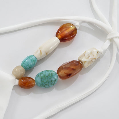 White Halter Tie Back Top with Gemstone Beaded Neck | noémi