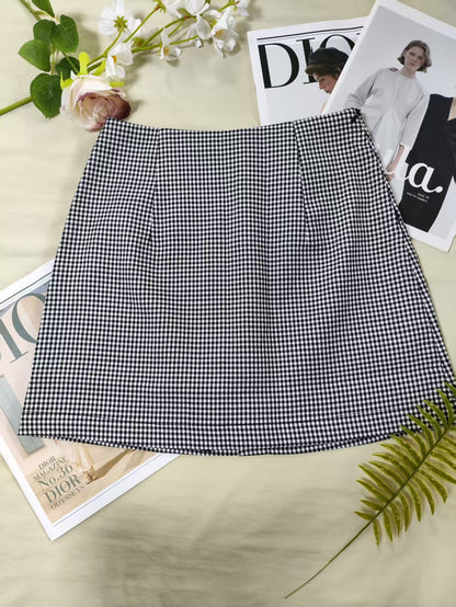 Button Front Mini Skirt | High Waist, Pocket Detail | noémi