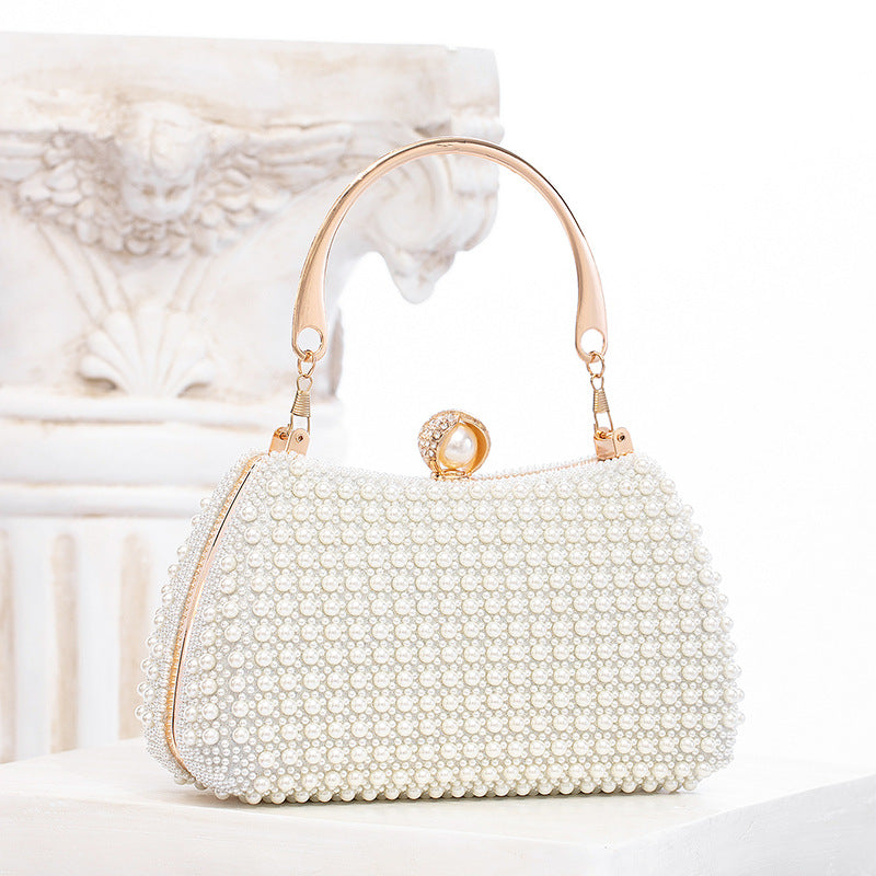 Elegant Pearl Evening Bag | White Clutch with Gold Chain for Parties & Events | noémi
