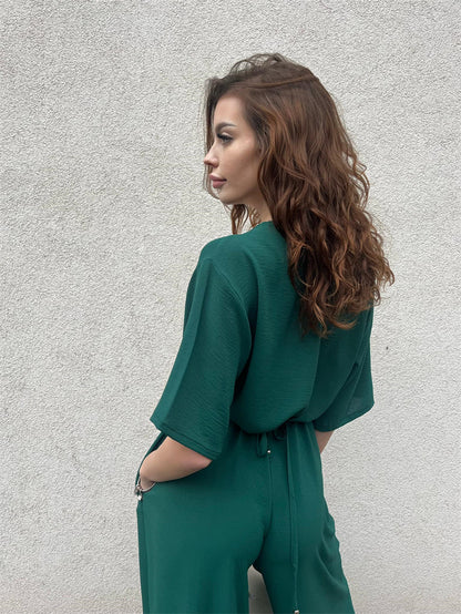 Women's Solid Color One Piece Jumpsuit | Deep V Neck, Tied Waist & Wide Leg Pants | noémi