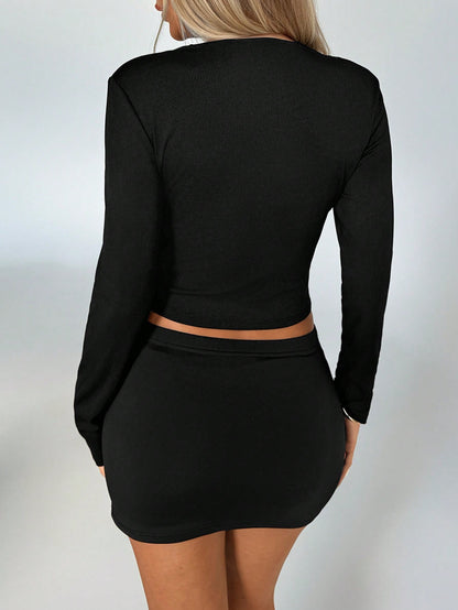 Tie Front Cut Out Knit Top | Long Sleeve Cropped Cardigan in Jet Black | noémi