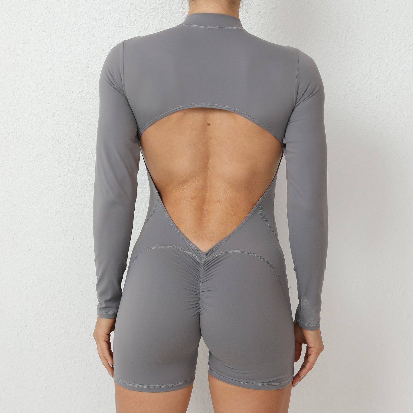 Women’s Cutout Back Yoga Jumpsuit | Long Sleeve, Zipper Front, Peach Hip, One Piece for Workout & Fitness | noémi