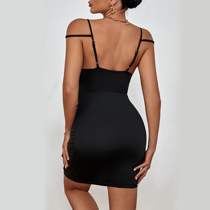 Black Sling Dress with Ruffle Hip and Cutout Detail | noémi