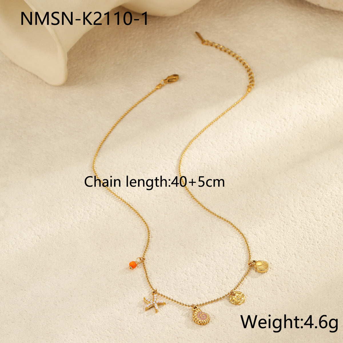 Ocean Inspired Layered Necklace | Gold Stainless Steel with Starfish, Conch & Shell Charms | noémi