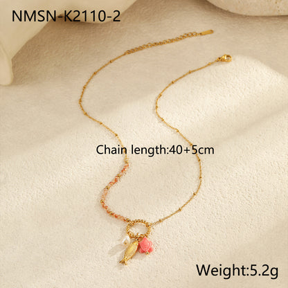 Ocean Inspired Layered Necklace | Gold Stainless Steel with Starfish, Conch & Shell Charms | noémi