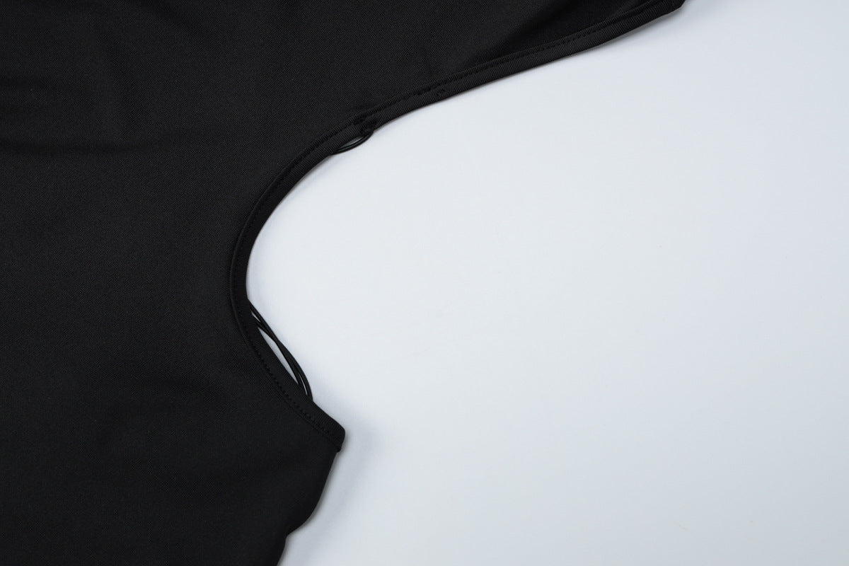 Womens Cutout Mini Dress with Butterfly Metal Detail and Backless Design | noémi