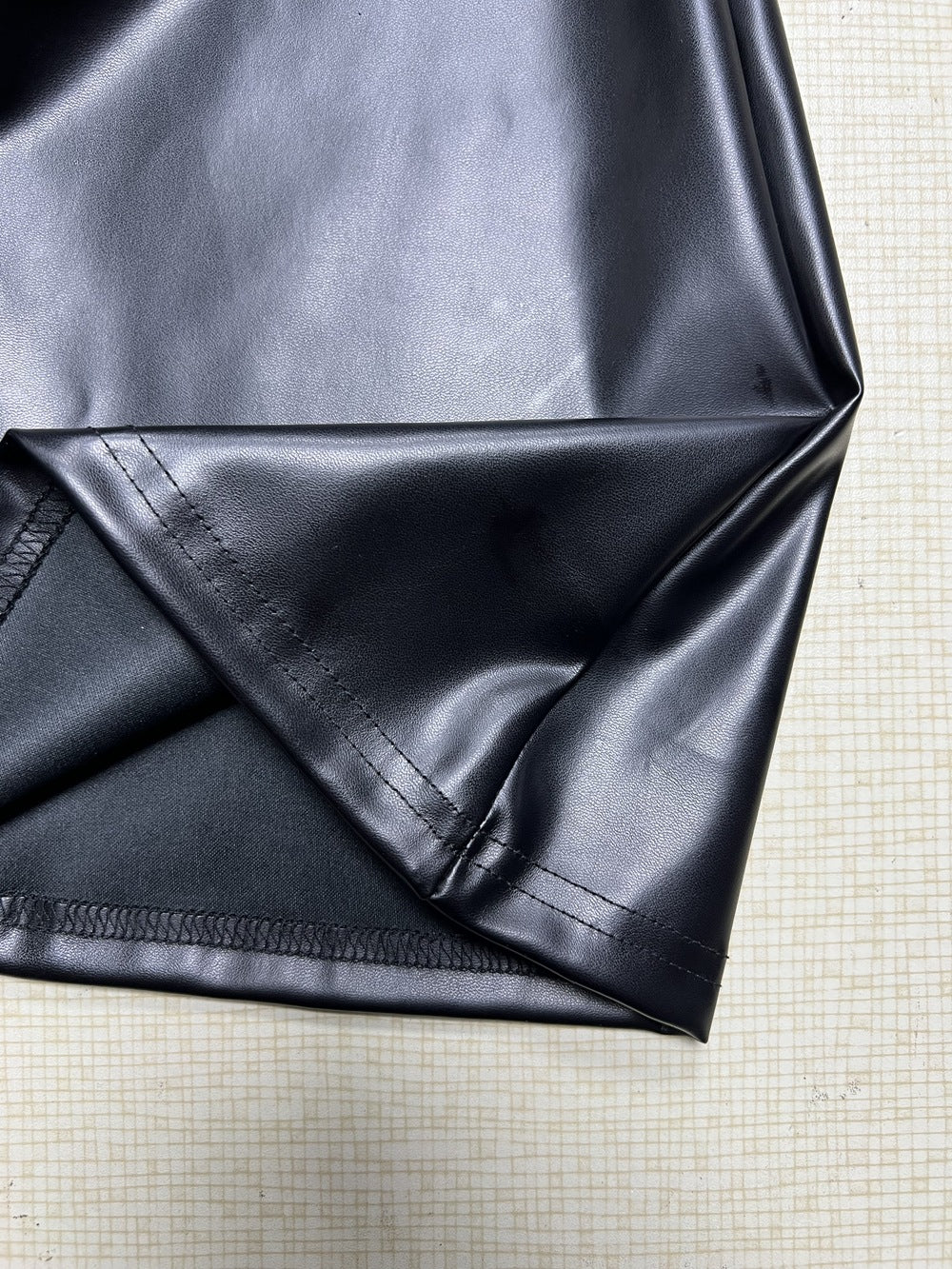 Womens Sleeveless Faux Leather Sheath Dress with Stand Collar Pleated Waist Hem | noémi