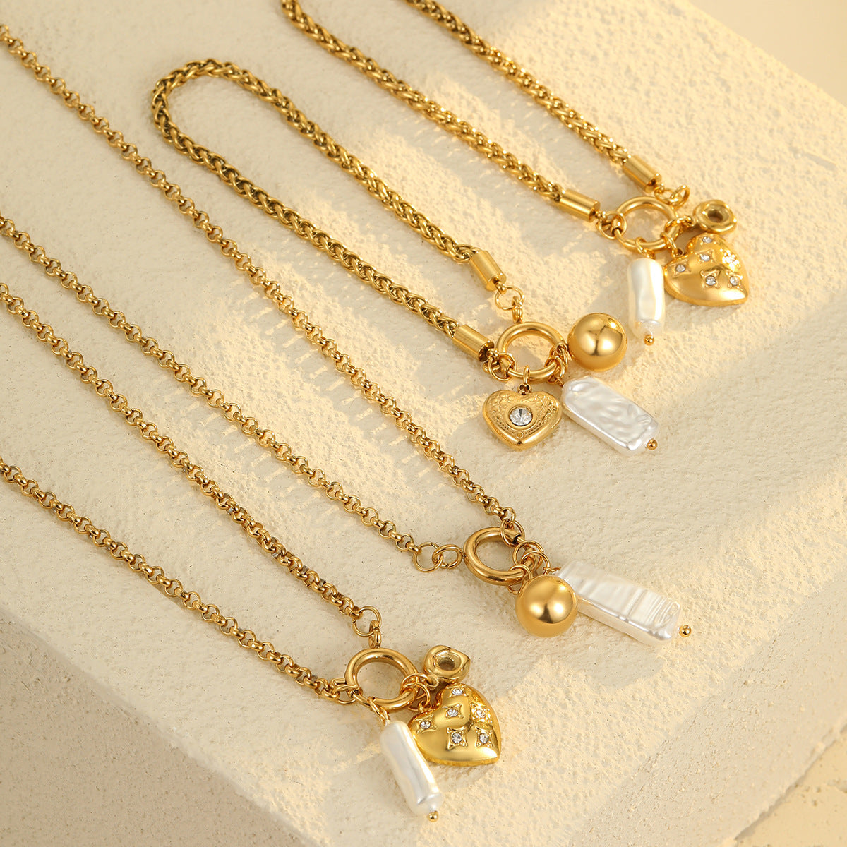 Gold Plated Stainless Steel Necklace & Bracelet Set | Pearl & Heart Charms, Diamond Accents | noémi