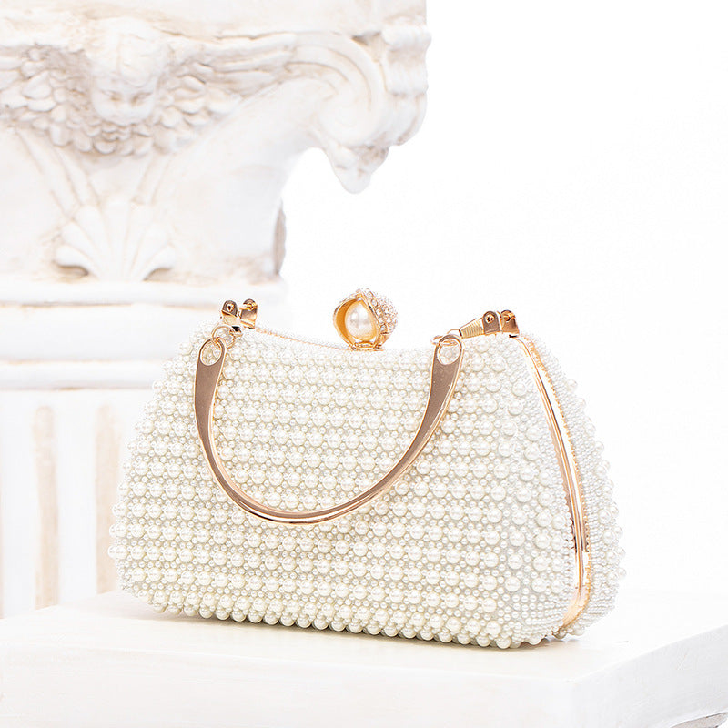 Elegant Pearl Evening Bag | White Clutch with Gold Chain for Parties & Events | noémi