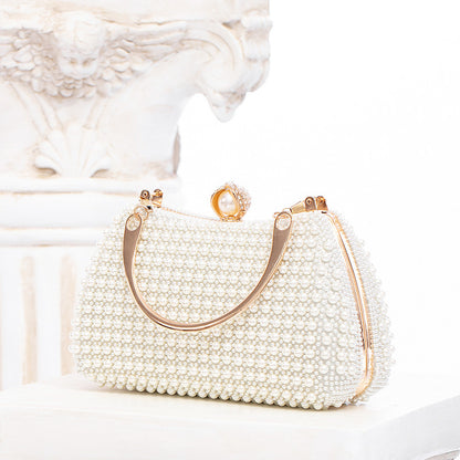 Elegant Pearl Evening Bag | White Clutch with Gold Chain for Parties & Events | noémi