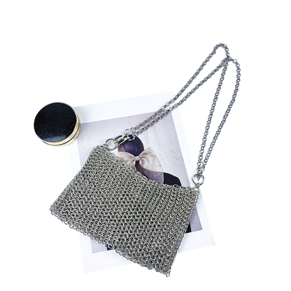 Metallic Hand‑Woven Shoulder Bag – Shiny Braided Texture, Silver Tone | noémi