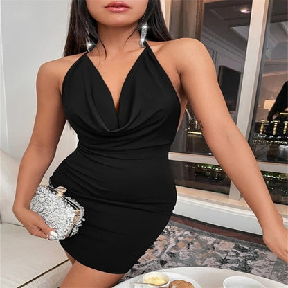 Backless Halter Mini Dress with Side Slit and Bow Tie Detail | noémi