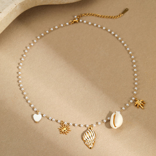 Marine Charm Pearl Necklace | Gold Stainless Steel Conch & Shell Pendant Choker | noémi