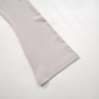 Women Long Sleeve Hooded Pleated Dress with High Waist and Hip Detail | noémi