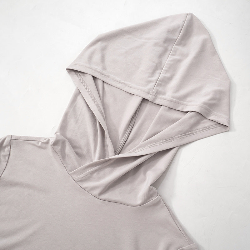 Women Long Sleeve Hooded Pleated Dress with High Waist and Hip Detail | noémi