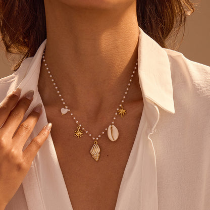 Marine Charm Pearl Necklace | Gold Stainless Steel Conch & Shell Pendant Choker | noémi