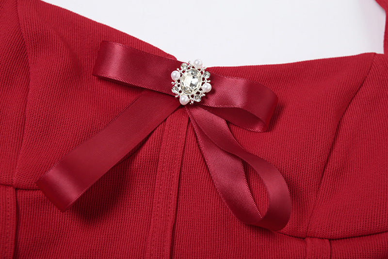 Backless Halter Dress with Bow Detail and Sequin Finish | noémi