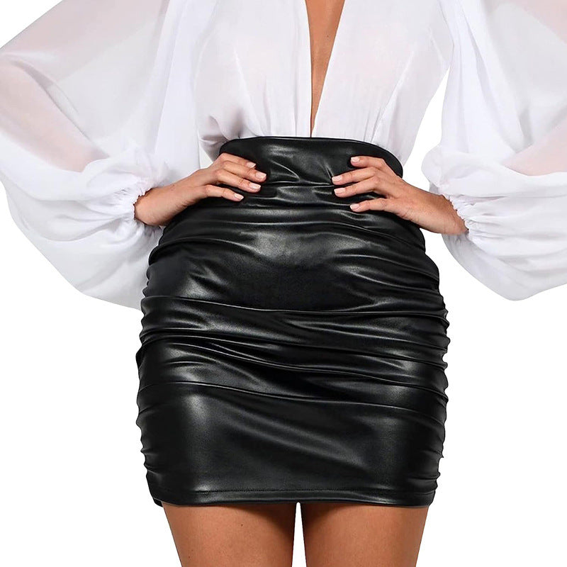 Women's Faux Leather Ruched Mini Skirt | High Waisted, Shiny Black Bodycon | noémi