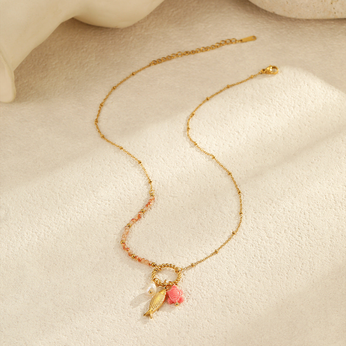 Ocean Inspired Layered Necklace | Gold Stainless Steel with Starfish, Conch & Shell Charms | noémi